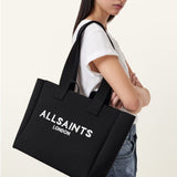 Allsaints Izzy Logo Print Medium Tote Bag In Black