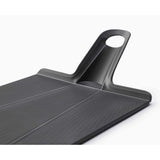 Joseph Joseph Chop2Pot™ Plus Black Folding Chopping Board Medium in Black