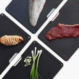 Joseph Joseph Folio™ Steel 4-piece Chopping Board Set With Black Stainless-Steel Case In Black