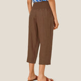 Masai Pallas Linen Trousers In Chestnut