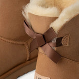 UGG Women's Mini Bailey Bow II Boot In Chestnut