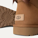 UGG Women's Mini Bailey Bow II Boot In Chestnut