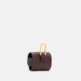 AllSaints AirPod Leather Case in Burnt Red