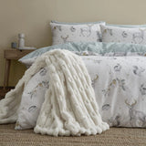 Bianca Carved Faux Fur Blanket Throw In Cream