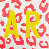 Bombay Duck Small Talk HAPPY Embroidered Cushion on Linen Coral/Yellow