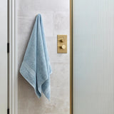 Christy Serene Face Towel In Faded Denim