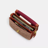 Coach Cassie Crossbody 19 In Signature Canvas in Tan Rust