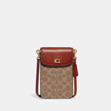 Coach Phone Crossbody In Signature Canvas in Tan Rust