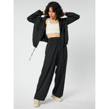 Girlfriend Collective Amy Adjustable Trousers In Black