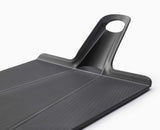 Joseph Joseph Chop2Pot™ Plus Black Folding Chopping Board Large in Black