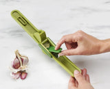 Joseph Joseph CleanForce™Garlic Press In Green