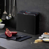 Joseph Joseph Folio™ Steel 4-piece Chopping Board Set With Black Stainless-Steel Case In Black
