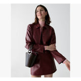 Kate Spade Halo Glazed Leather Mini Bucket Bag in Hot Fudge