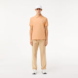 Lacoste Original L.12.12 Petit Pique Cotton Polo Shirt in Light Orange