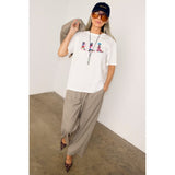 Never Fully Dressed Cowboy Boot T-Shirt In White