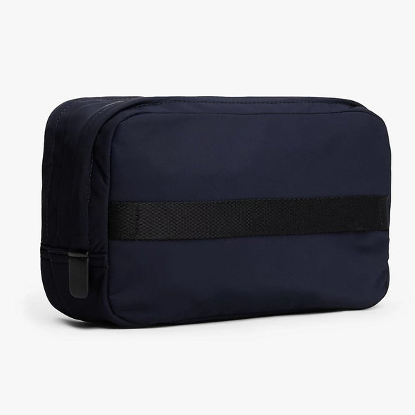 Tommy Hilfiger Metal Logo Patch Washbag In Space Blue